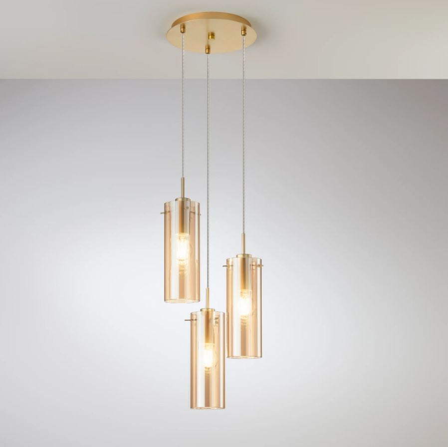 Sosp.3 luci forme cilindriche in metallo nero con vetro fumè o metallo oro con vetro ambra 3XE27 non incl. MAGIC Sosp.3 luci forme cilindriche in metallo nero con vetro fumè o metallo oro con vetro ambra 3XE27 non incl. MAGIC
